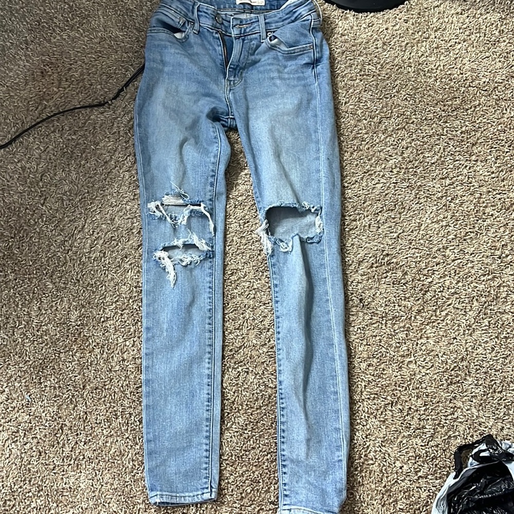 ripped levi’s jeans